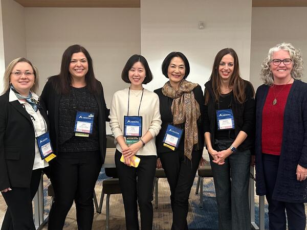 Group photo of researchers at conference